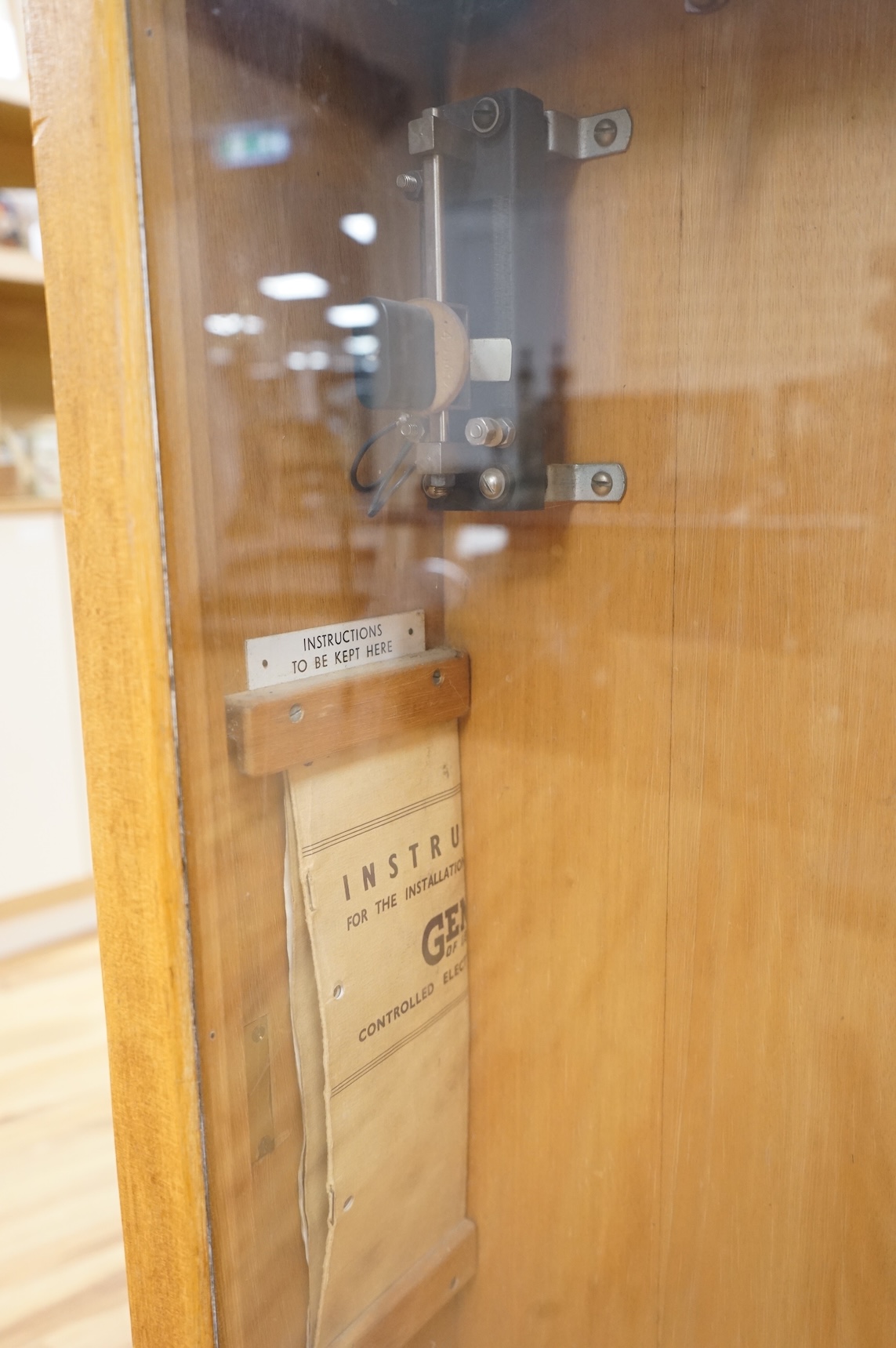 A floor standing Blick-Electric synchrome master clock, 128.5cm high x 29cm wide